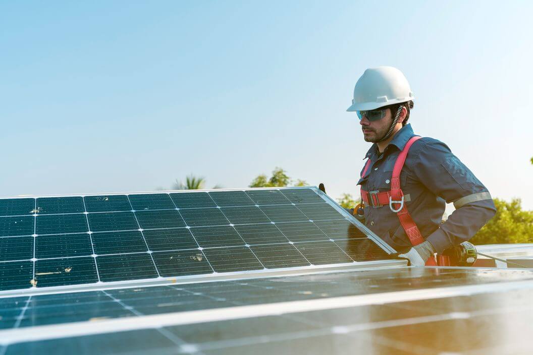 Man Installing Solar Panels