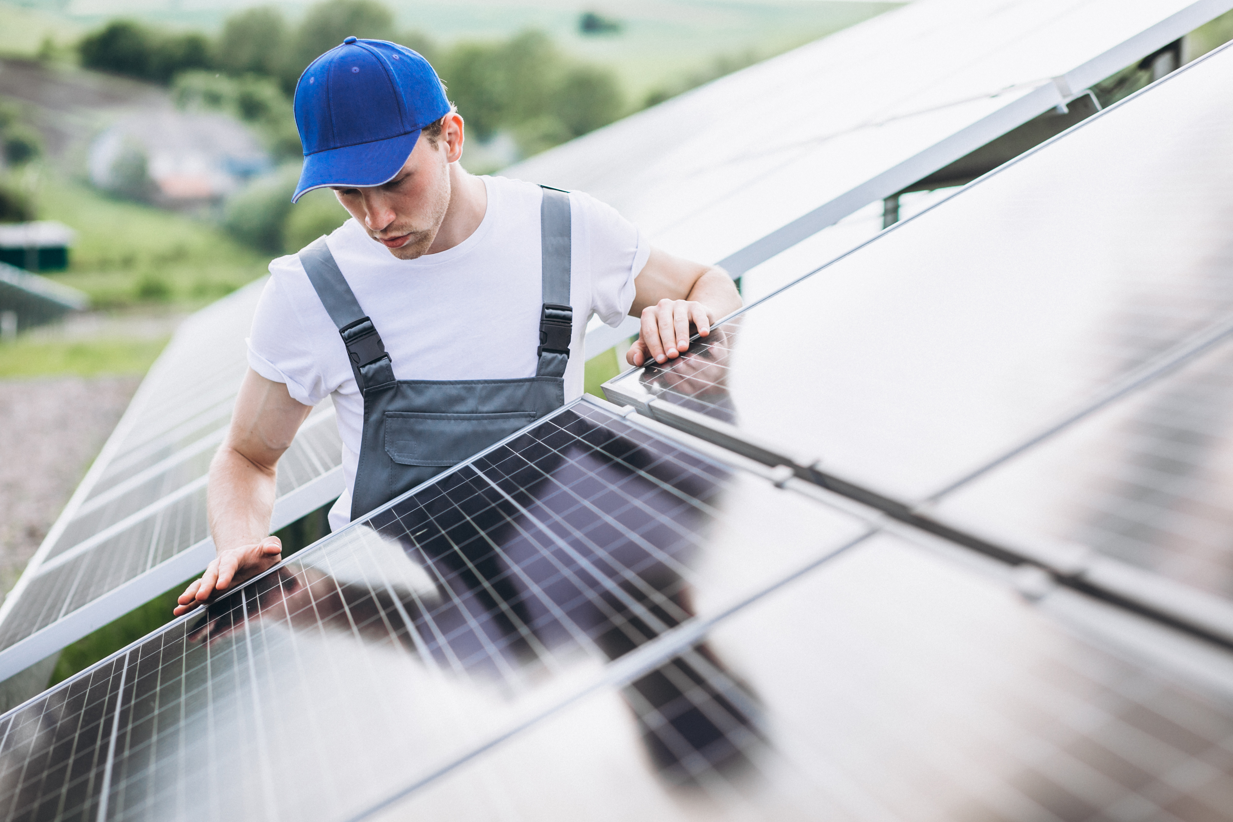 Man Checking Solar Panels